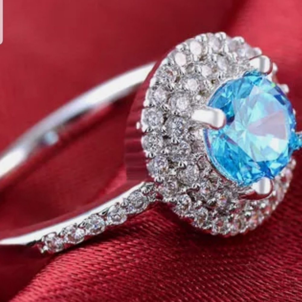Elegant Simulated Blue Topaz Ring - Picture 2 of 3